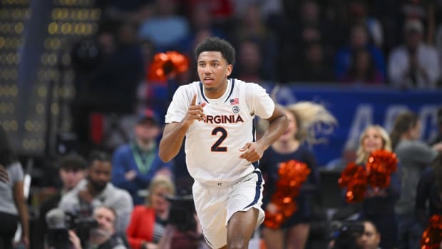 Reece Beekman reacts during the Virginia men's basketball game against NC State in the semifinals of the 2024 ACC Men's Basketball Tournament.